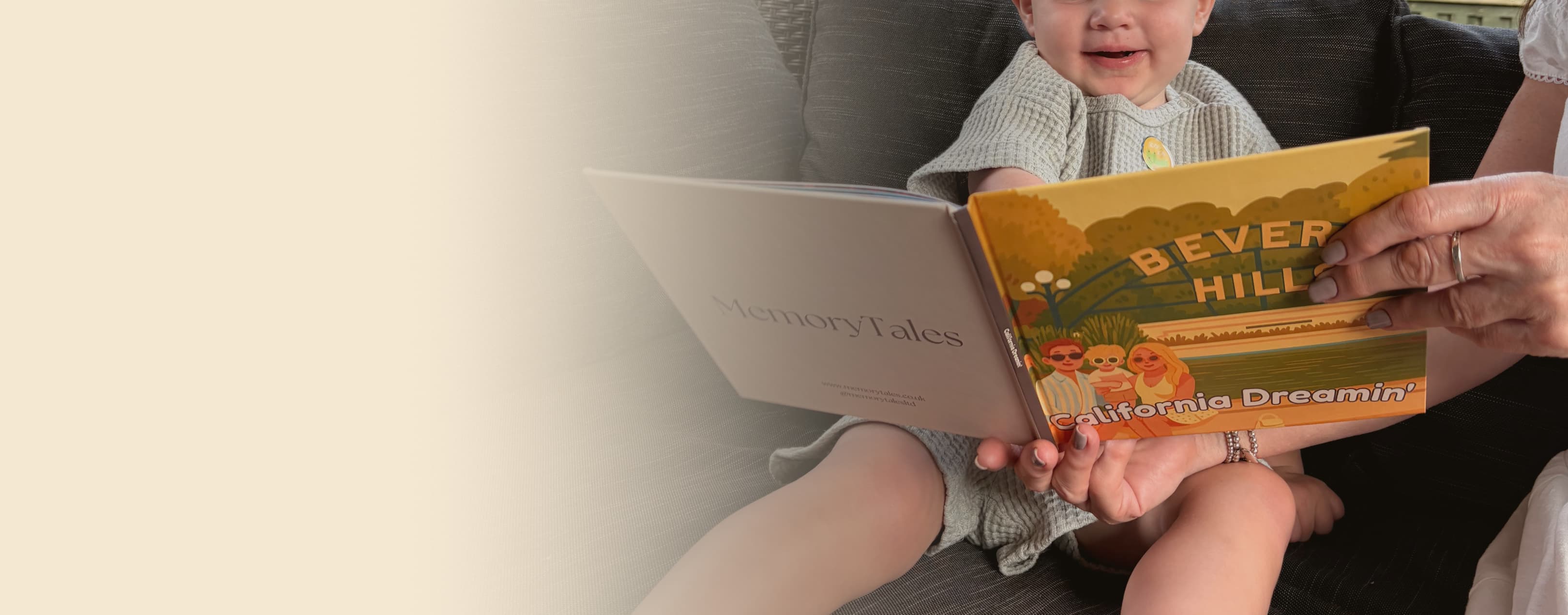 A baby laughing while reading a personalised MemoryTales storybook